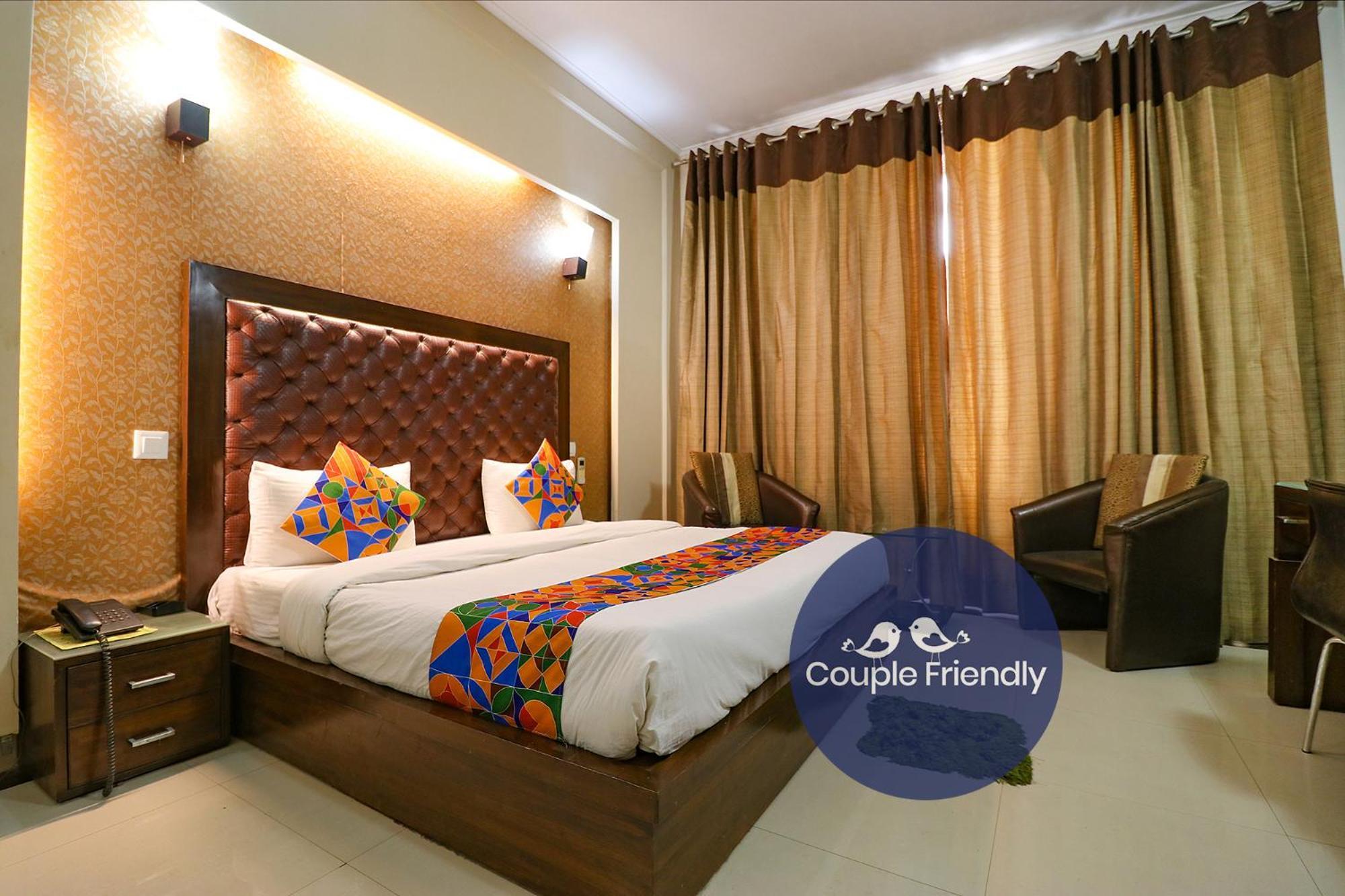 Fabhotel Happy Residency होटल