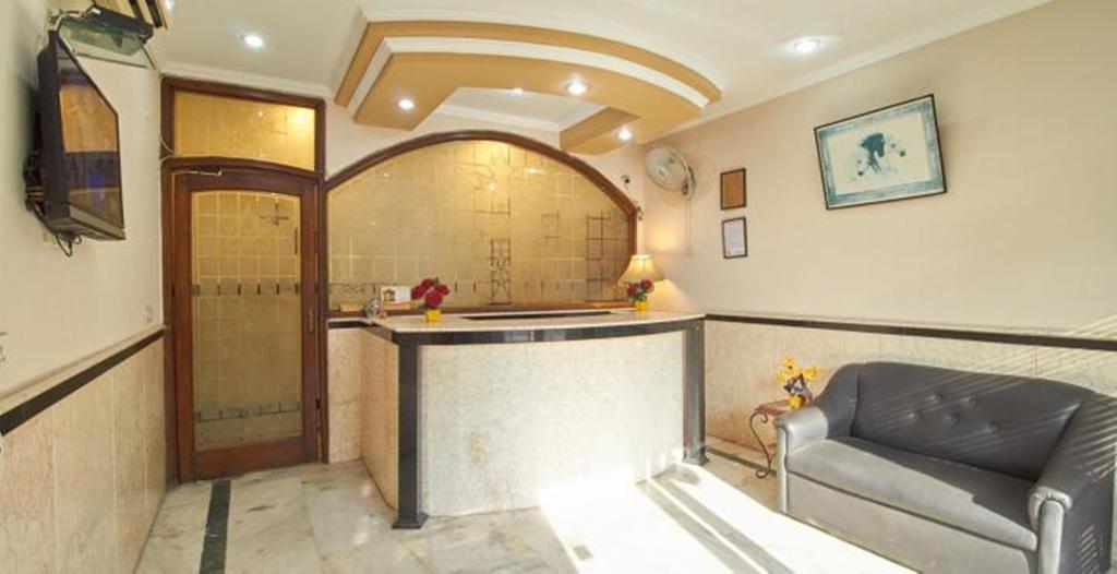 होटल Fabhotel Happy Residency