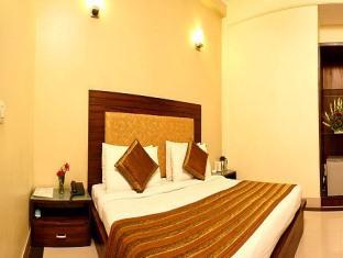 होटल Fabhotel Happy Residency